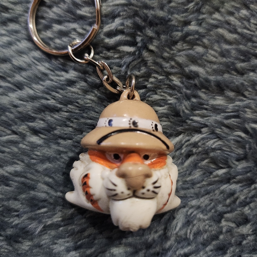 vintage 1997 Exxon Tiger promotional keychain, featuring the company's tiger